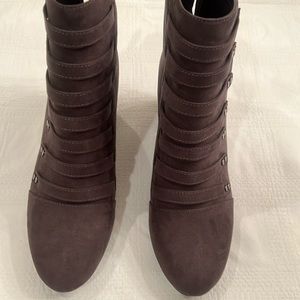 Elegant wide heel faux suede bootie.  Size 9